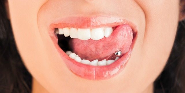 como afecta los piercings a tu salud bucal